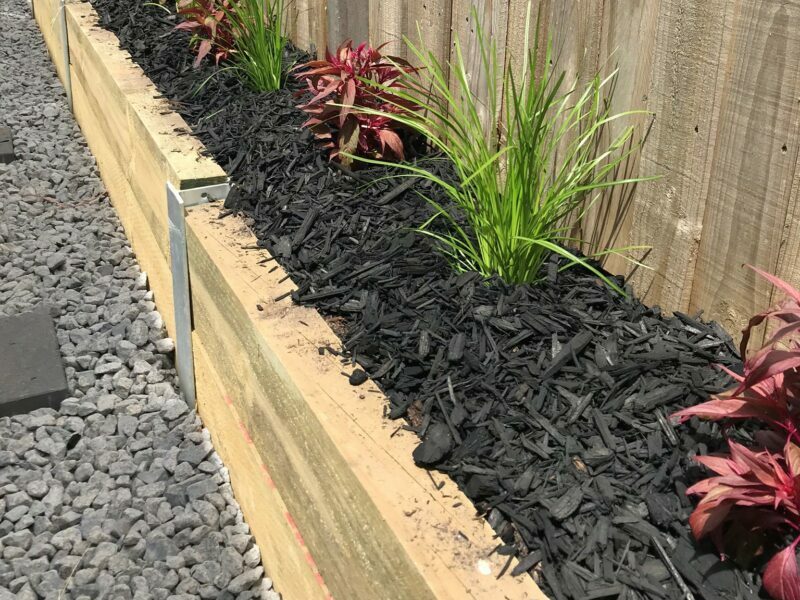 Retaining wall at side of house